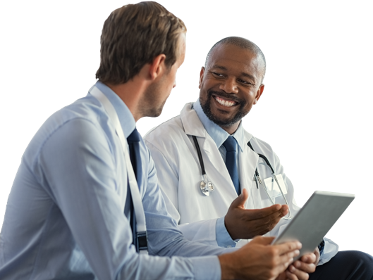 Doctor in a white coat having a discussion with a person in a shirt and tie